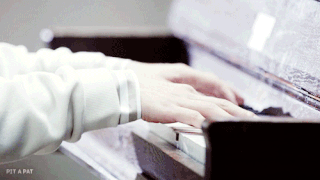 suga playing tiny piano