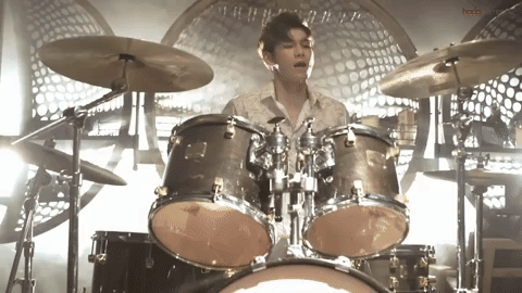 Ong Seong-wu while playing the drums